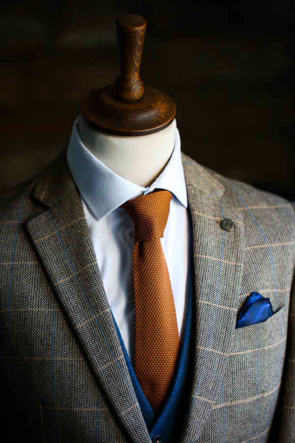 Rust knitted tie from Marc Darcy