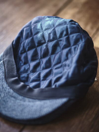 Quilted inner lining of a traditional blue flat cap