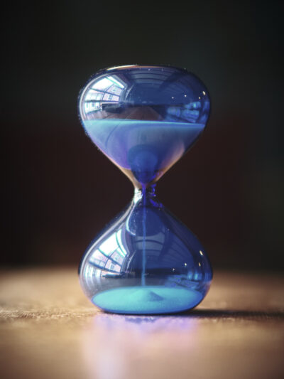 Modern contemporary sand timer hourglass in blue glass