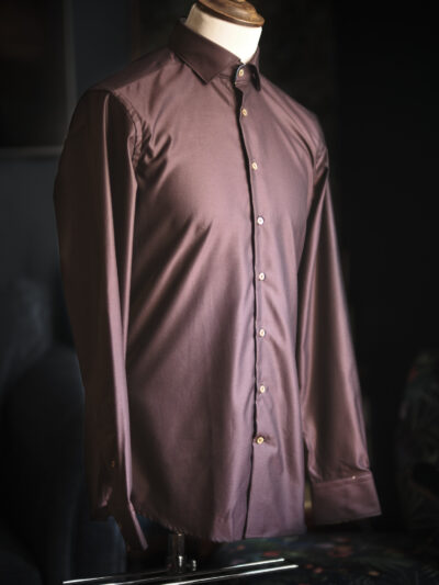 A luxury Italian brown shirt with floral contrast lining