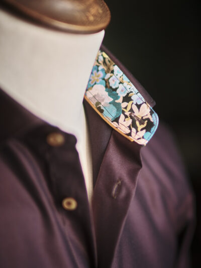 A luxury Italian brown shirt with floral contrast lining
