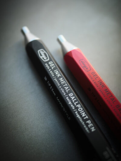 Modern contemporary Japanese ballpoint pens in black and red metal